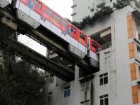 A miracle of Chinese architecture - a monorail through a residential building in Chongqing